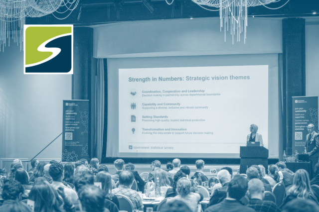 GSS Deputy Heads on stage at GSS Conference, Strength in Numbers on the screen.